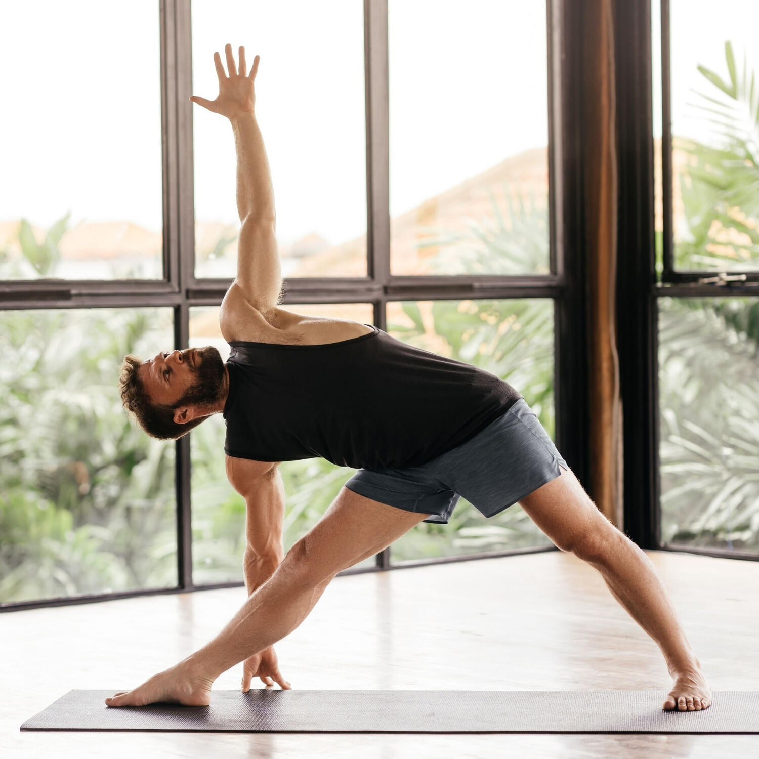 Yoga Kendra Malmö Vinyasa Man doing yoga on a mat
